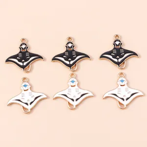 Set of six tropical stingray charms in black and white enamel with gold metal edges