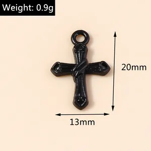 Detail view of 20mm x 13mm black cross pendant showing weight 0.9g and size specs