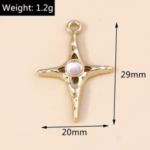 Detailed size view of gold star cross pendant with moonstone showing 29mm height