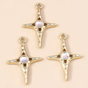 Golden cross star pendants with hammered texture and opal-like stones for DIY jewelry