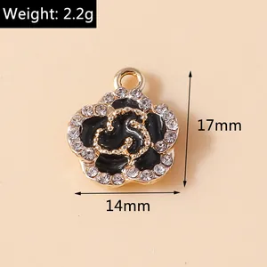 Detailed view of black enamel rose charm with white rhinestones and dimensions 17x14mm