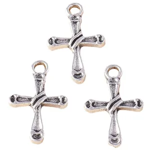 Set of three vintage silver cross pendants for DIY jewelry making with textured details