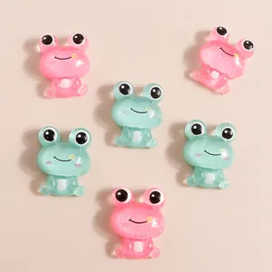 Cute resin cartoon frog charms in pink and green with glitter for DIY phone case craft
