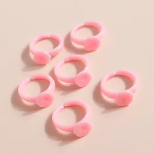 6-pack pink plastic glue rings with flat base for eyelash extensions and nail art