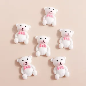 Lot de six ours en résine blanche avec nœuds roses pour décoration de coques DIY