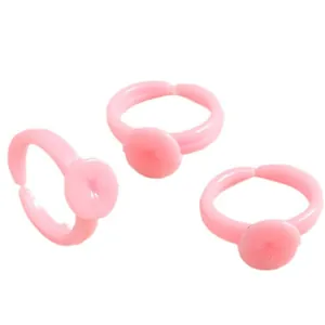 Adjustable pink plastic DIY ring bases with flat round pads for girls jewelry making