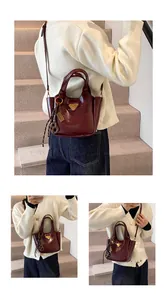 Deep red oily leather tote bag shown in lifestyle scenes with triangle logo detail
