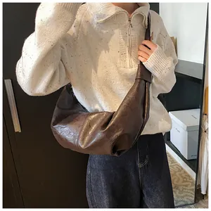 Deep brown large crescent crossbody bag with pleated retro soft leather texture
