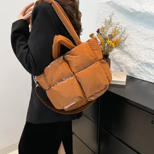 Caramel large quilted puffer tote bag with thick handles and adjustable shoulder strap