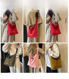 Detail view of large faux shearling tote bag in multiple colors for winter style