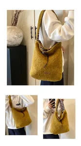 Detail of yellow plush tote bag showing soft faux fur texture and drawstring closure