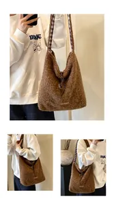 Detail of plush brown tote bag featuring soft faux fur texture and branded leather label