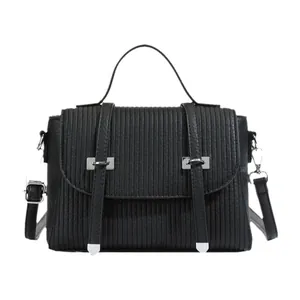 Chic black pleated PU leather crossbody bag with silver hardware and top handle