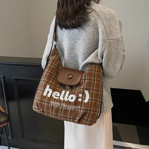 Retro brown plaid tote bag for women with leather flap and 'hello' printed design