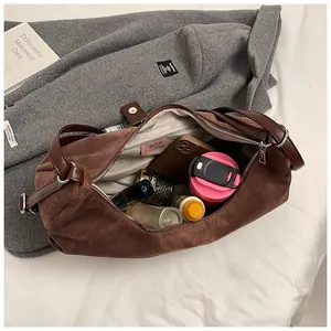 Internal view of brown suede tote bag showing large capacity for daily essentials