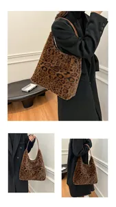Detail of leopard print plush tote bag showing soft faux fur texture and brown leather strap