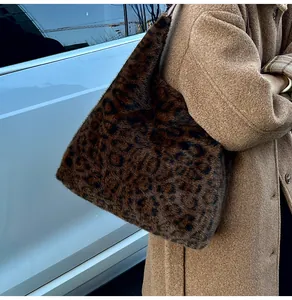 Detail of plush leopard print tote bag texture and large capacity fit on shoulder