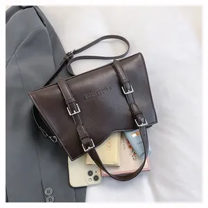 Detail view of deep brown leather tote bag interior showing large capacity for essentials
