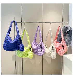 Detailed quilted cloud bag collection featuring five vibrant colors with matching coin purses