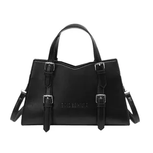 Classic black leather tote bag with silver buckles and detachable strap for daily commute