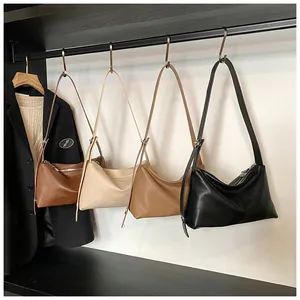 Détails de sacs portés épaule demi-lune vintage en marron, beige, kaki et noir élégant