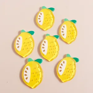 DIY resin lemon charms with glitter and green leaves for phone case decoration