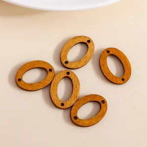 Set of 5 oval brown wooden rings with double holes for DIY jewelry making and crafts