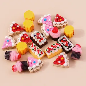 Miniature resin food charms set featuring colorful cakes and cookies for DIY crafts