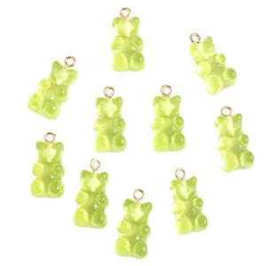 Set of 10 translucent green resin gummy bear pendants with gold metal loops for DIY jewelry