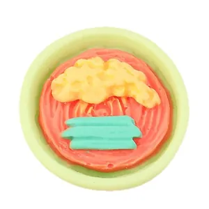 Miniature resin food charm for DIY crafts featuring a green bowl with noodles and egg