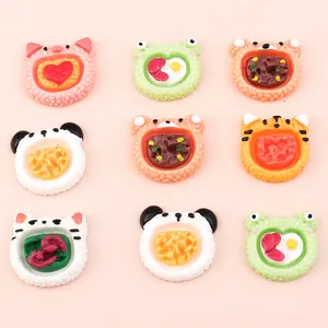 Detailed macro view of 9 miniature resin animal food charms for DIY phone case crafts