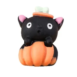 Figurine Halloween en résine avec chat noir dans une citrouille orange déco