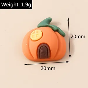 Macro detail of 20mm resin Halloween pumpkin house charm showing 1.9g weight and dimensions