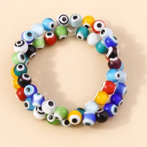 Detailed view of colorful 8mm evil eye resin beads for DIY bracelet jewelry making