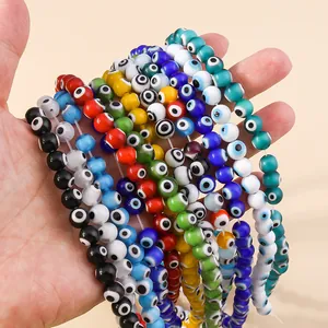 Macro detail of multi-color 8mm evil eye beads for handmade jewelry and DIY bracelets