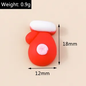 Detailed macro view showing the precise dimensions of the resin Christmas glove DIY charm