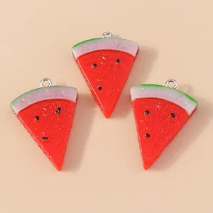 Three resin watermelon slice pendants with silver metal loops for DIY jewelry making