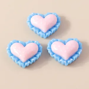 DIY sweet resin heart charms with pink polka dots and blue lace trim for crafts