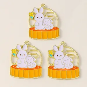 Detailed view of 3 enamel bunny mooncake charms for Mid-Autumn festival DIY jewelry craft