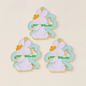 Close-up of Chinese style rabbit charms with enamel flute detail for DIY jewelry making