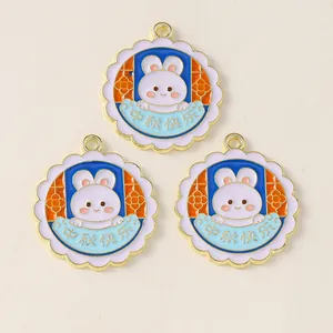 Detail of enamel bunny pendants with Mid-Autumn Festival greeting for DIY jewelry