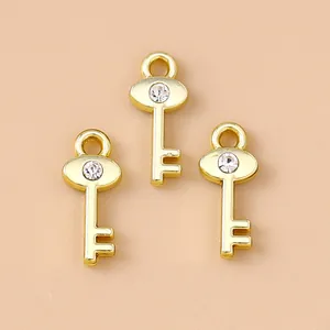 Drei goldene Zinklegierung Schlüsselanhänger mit Strass für DIY Schmuck und Ketten