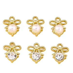Golden bow charms with pearls and rhinestones for DIY earring and necklace making