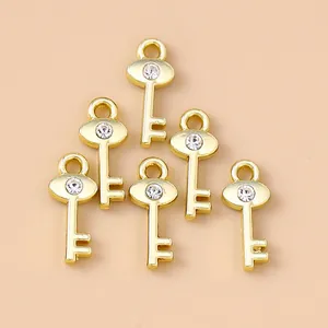 Sechserpack goldene Schlüsselanhänger aus Zinklegierung mit Kristallen für DIY-Schmuck