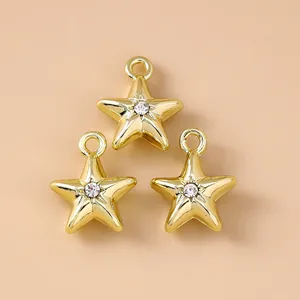 Three gold star pendants with rhinestones for DIY earring and necklace making