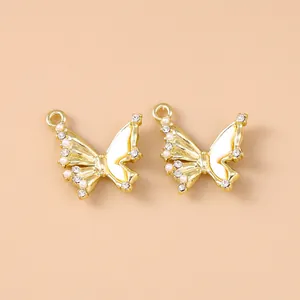 Golden butterfly charms with pearls and rhinestones for DIY jewelry making