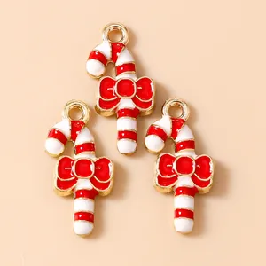 Christmas candy cane pendants with red bows and gold plating for DIY jewelry making