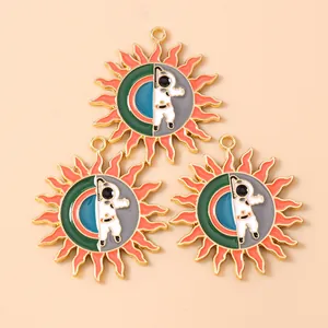 Solar astronaut enamel charms set in bright yellow and orange for DIY jewelry making
