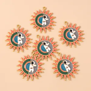 Detailed view of astronaut themed solar flare pendants for DIY jewelry crafting