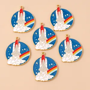 Detailed view of colorful enamel space travel shuttle charms for DIY jewelry making